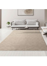 Tapis uni beige à franges IMPULSE